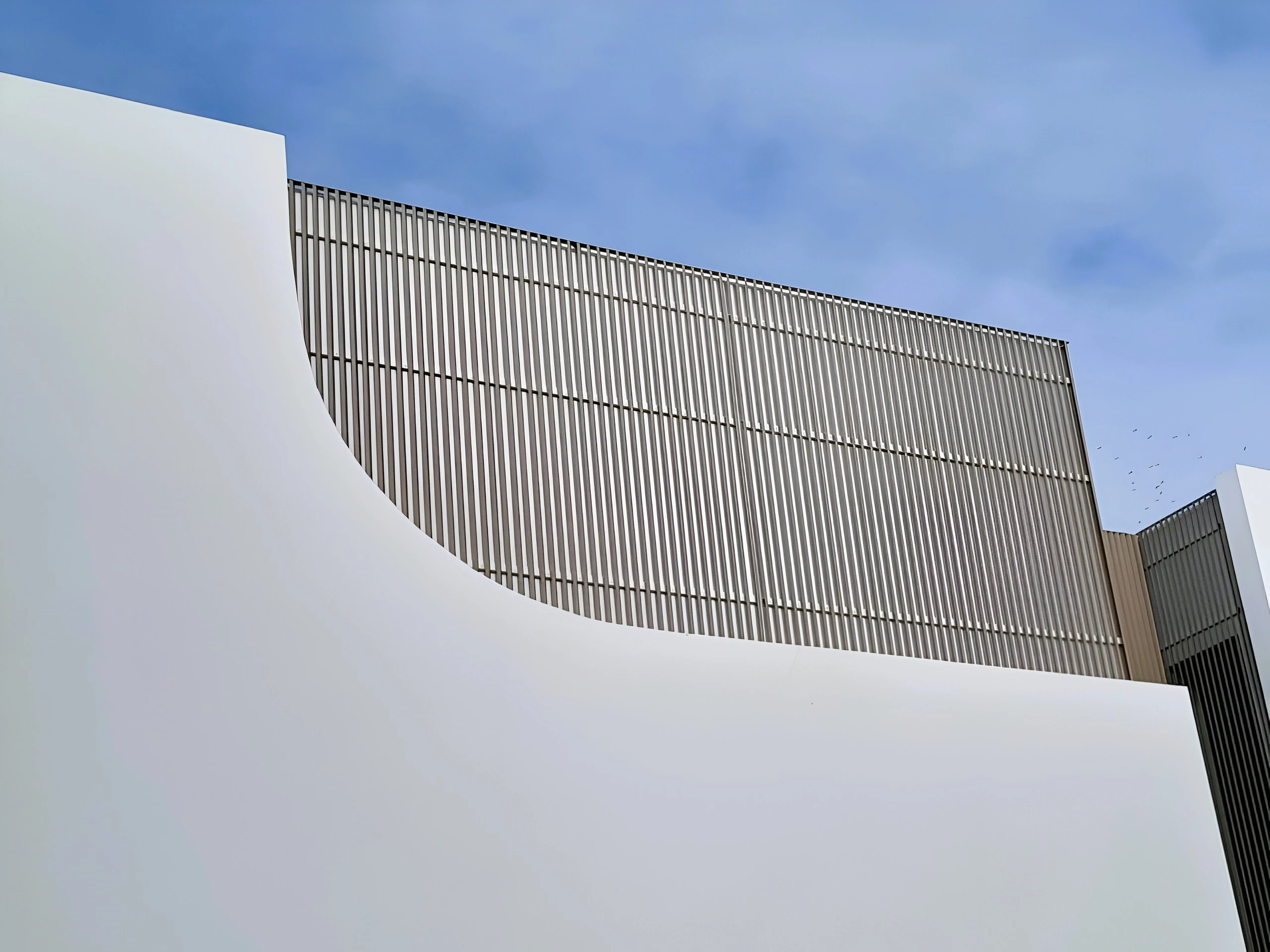 Brise-soleil BREEZE à lames biseautées